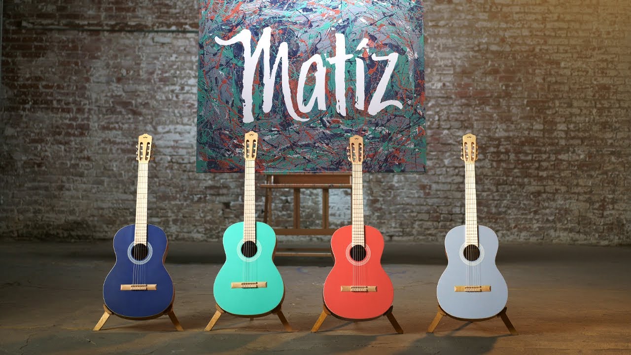 The Matiz series — four colorful nylon-string guitars in front of a painted Matiz canvas